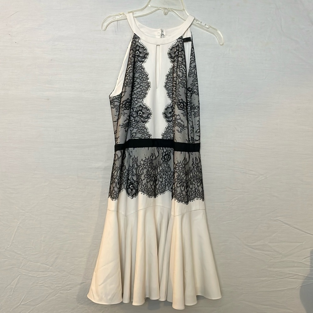 BCBG MaxAzria  white with black lace halter dress, tiny spot on lower left side.